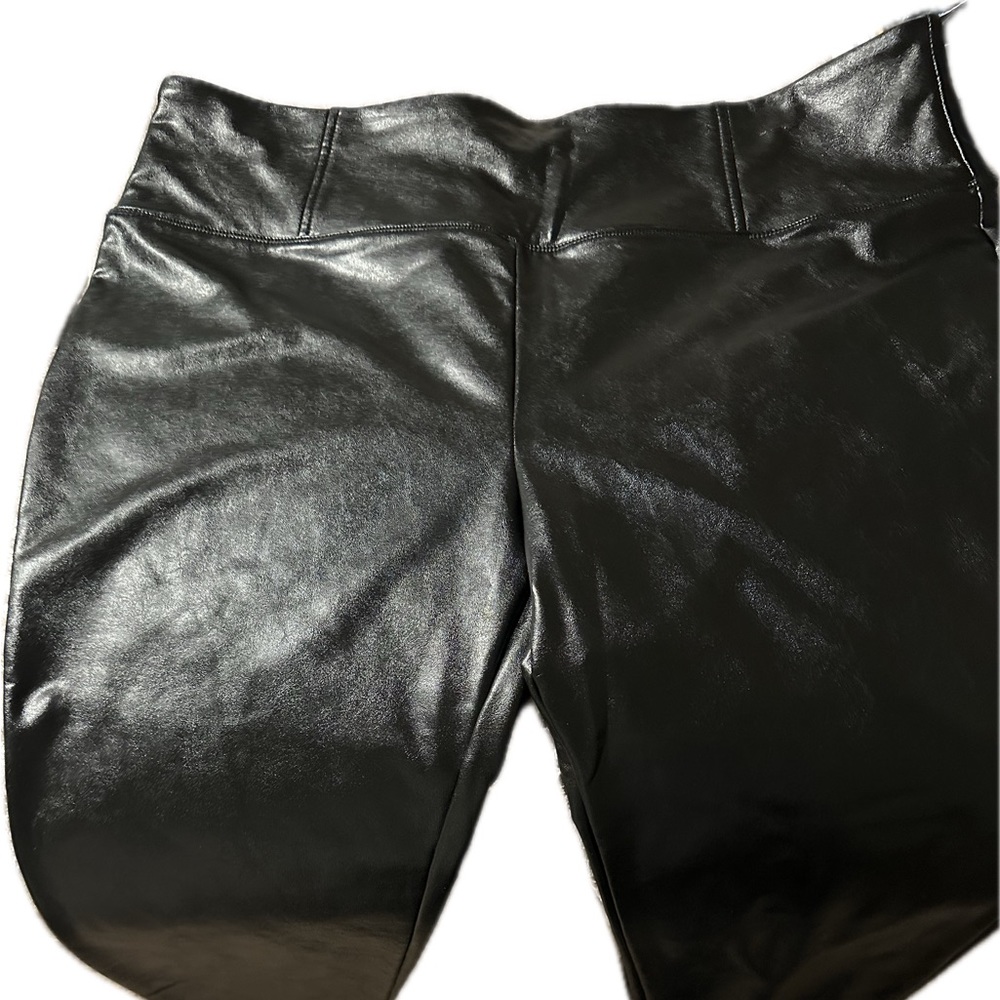 Black faux leather leggings.
